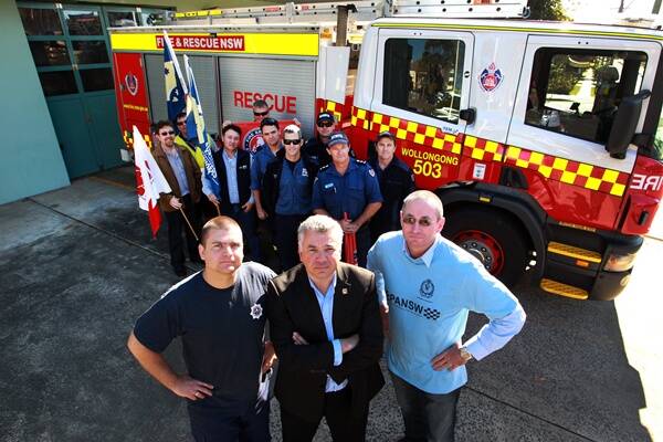 Fire and Rescue NSW employees' delegate Andrew Haas (left), South Coast Labour Council's Arthur Rorris and NSW Police Association branch official Bob Minns. Picture: ORLANDO CHIODO