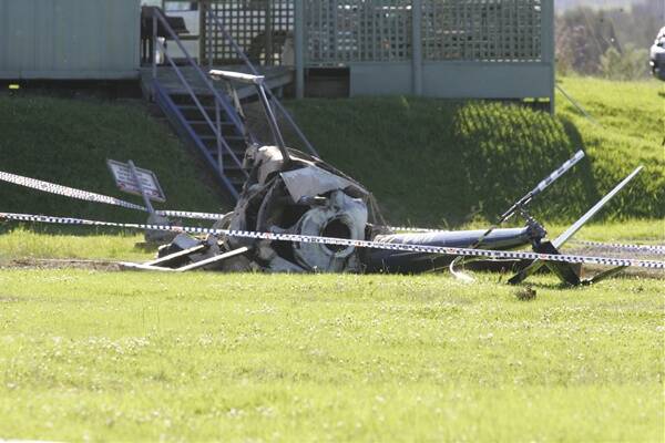 The wreckage following Saturday's helicopter crash at Jaspers Brush. Picture: ROBERT CRAWFORD