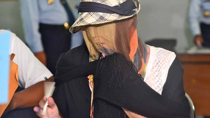 Released from prison: Schapelle Corby covered her face when she left jail. Photo: Justin McManus 