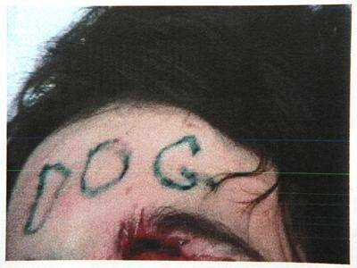 A police image of the victim’s forcibly tattooed head.
