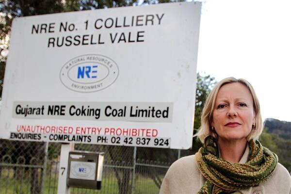 Resident activist Kaye Osborn outside the Gujarat NRE mine at Russell Vale yesterday. Gujarat NRE has been summonsed to appear before the Land and Environment Court on July 20 over longwall mining operations at the colliery. Picture: SYLVIA LIBER