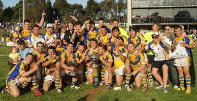 Warilla players enjoy the moment of triumph after ending a 14-year premiership drought by defeating the Gerringong Lions.