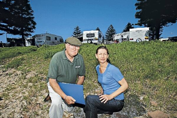 Roy Thorburn and Sue Lark of Kiama Family History Centre at Shellharbour caravan park, the site of the old cemetery. Picture: GREG TOTMAN