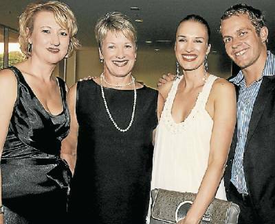 Sylvia Kotevski, Jan Spence, Megan Spence and Michael Lewis, of RMB Lawyers, at the Crown St Mall Retail Awards last night. Picture:ROBERT PEET