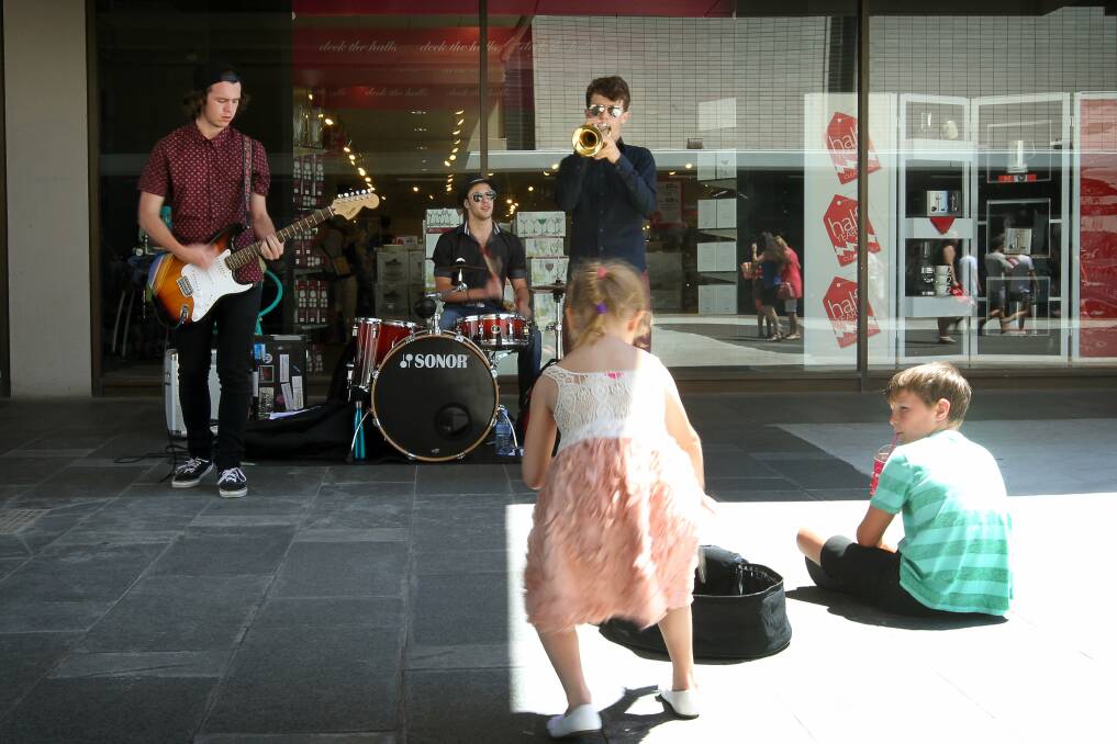 Alex Turner, 17, Theodore Papadopoulos, 17, and Jack Purdon, 16, wowing the children. Picture: SYLVIA LIBER
