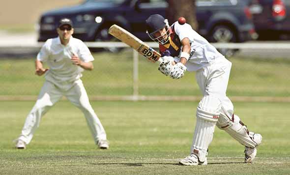 Amit Balgi on the attack for University, on his way to his maiden first grade century and an unbeaten 105 against Port Kembla at King George Oval on Saturday.  ANDY ZAKELI
