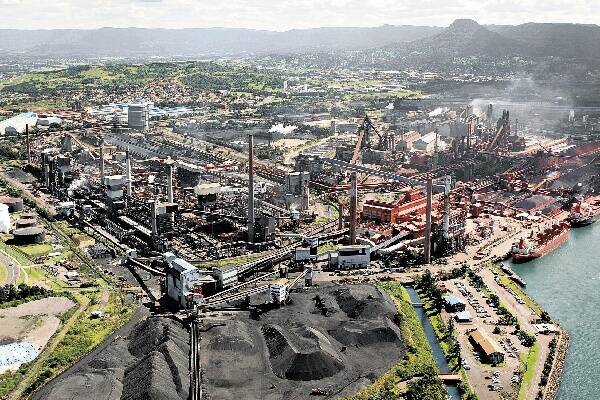 Port Kembla steelworks, where BlueScope Steel may build a co-generation power plant - if it can remove all the financial barriers. The plant, expected to cost at least $1 billion, would reduce greenhouse gas emissions each year equivalent to taking 185,000 cars off the road. Picture: KEN ROBERTSON