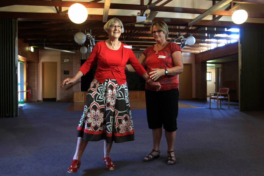 Stepping On's Gail Etheredge works through some balancing moves with Beth Robinson at the Bulli Senior Citizens Club. Picture: SYLVIA LIBER