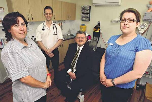 Registered nurse Michelle Taylor, Dr Steffan Erikkson, Dr Mark Condon and registered nurse Anne Harding at Albion Park Medical Services, which is trying to attract a nurse practitioner. Picture: ROBERT PEET