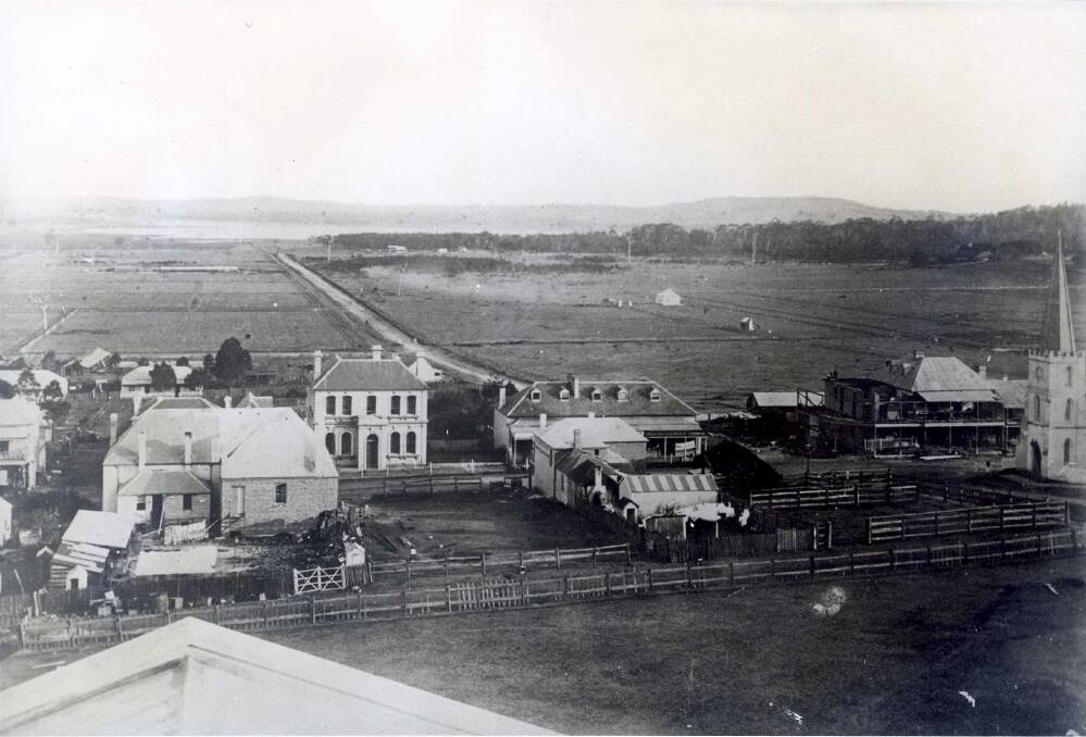 The original expanse of Tom Thumb Lagoon is shown in the background of this early scene of the intersection of Crown and Church streets. In 1877, the treacherous passage claimed the life of a citizen. Credit: From the collections of the Wollongong City Library and the Illawarra Historical Society.