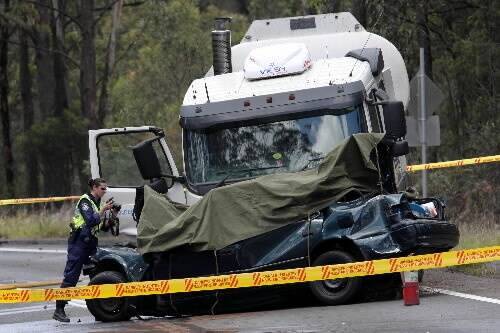 The scene of yesterday's smash on Picton Rd, which left five members of one family dead. Picture: KEN ROBERTSON