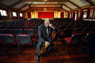 Favourite: John Comelli, pictured in Anita's Theatre in 2008, says he is a victim of the global recession. The theatre has been taken over by receivers. Picture: KIRK GILMOUR