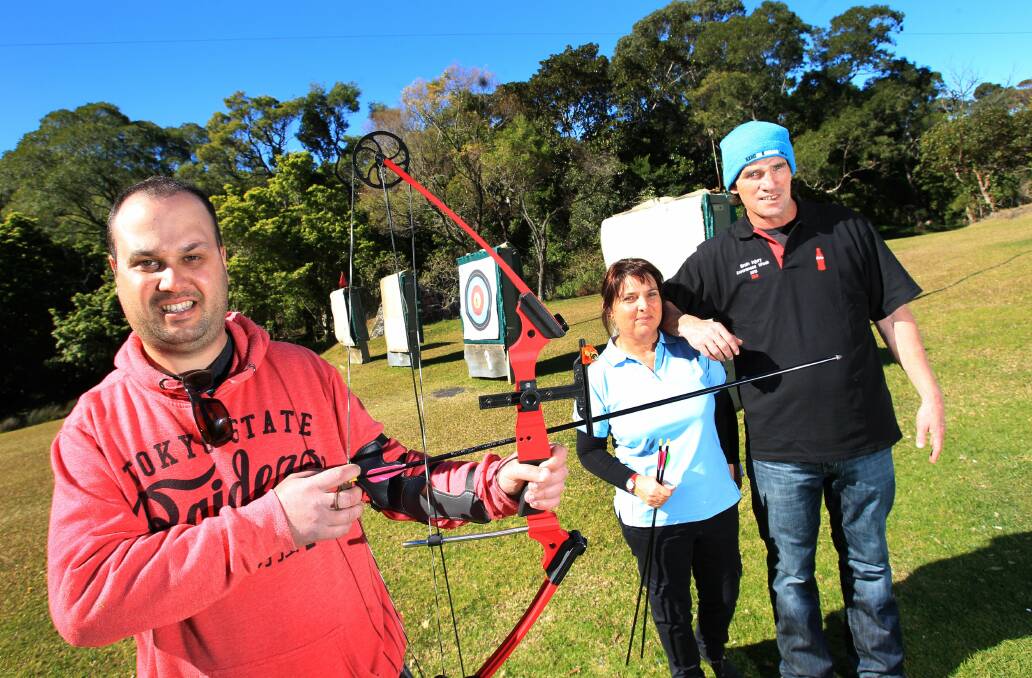 Headway Illawarra co-ordinator Robyn Russell with Oliver Ivaneza (left) and Mark Way. Picture: ORLANDO CHIODO