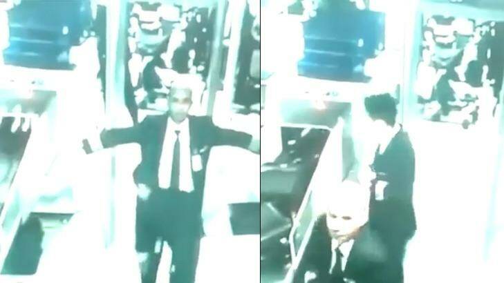 CCTV footage shows the pilots of flight MH370 passing through airport security.
