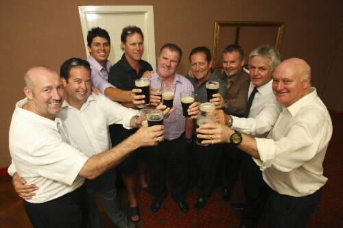 Members of the 531 group enjoy a Tooheys Black at the wake for Ted Tobin.