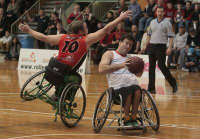 Mick Taylor takes a shot at goal  during the Roller Hawks’ grand final win over the Wheelcats. Picture: DAVE TEASE