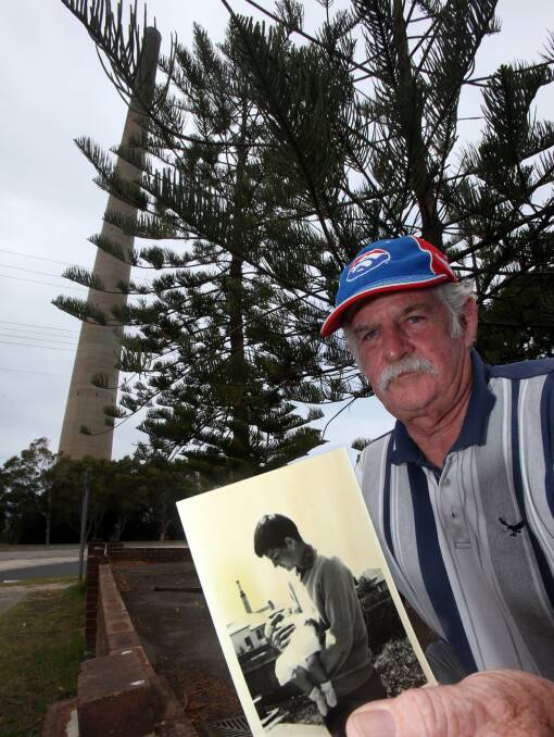 Colin Willett in front of the stack with a photo of him as a 14-year-old in 1964 with niece Ann. Picture: ROBERT PEET