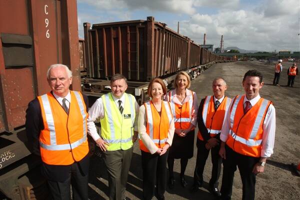 Prime Minister Gillard with local MPs and Port Corporation officials at the Port Kembla Outer Harbour this morning. Photo: ROBERT PEET