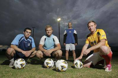 Fernhill Football Club players  Sam Gordon (left), Monty Pfrengle and Dale White, along with coach Alan Boyle (back), are preparing for the Illawarra Premier League kick-off this weekend. The newly merged Dapto Dandaloo Fury are clear favourites in what should be a strong competition. Picture: DAVE TEASE