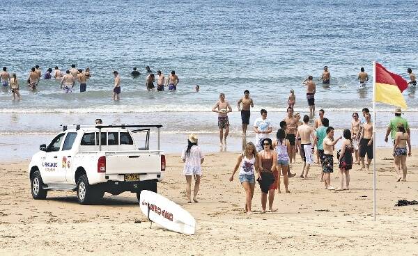People flock to Wollongong's North Beach yesterday as temperatures rose to 27 degrees. The public are asked to take extra precautions following five drownings over the past year. Picture: ROBERT PEET