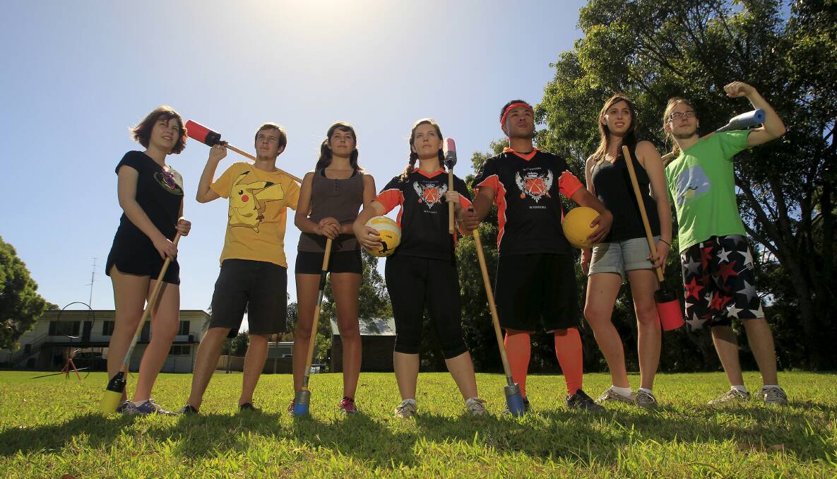 Members of the Wollongong Warriors Quidditch Club take a break during training at Robinson Park (from left) Cian Corby, Jacob Fleming, Nicole Cabrera, Morgan Legg, Zeke Azib, Lauren Bacon and Brandon Heldt. Picture: ANDY ZAKELI