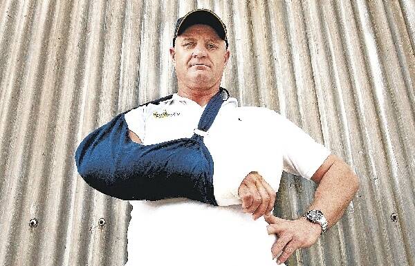 A defiant Bob Mirovic is eager to tackle rival John Hopoate again, despite suffering a broken arm in their recent Australian heavyweight title clash on the Gold Coast. Picture: ORLANDO CHIODO