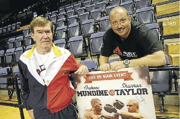 Referee/judge Bruce McTavish and trainer Rick Staheli are key members of Shannan Taylor's support crew. Picture: ORLANDO CHIODO