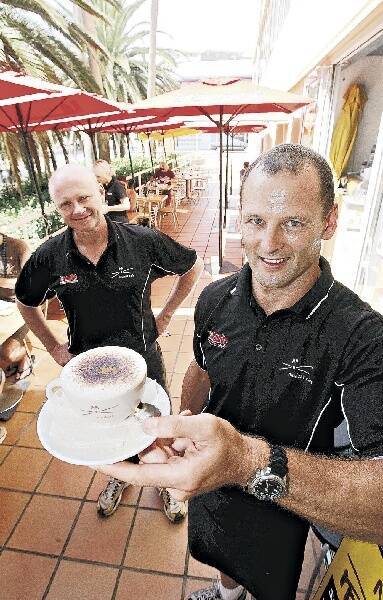 Paul Newman and Brett Rodwell have been enjoying a busy summer at Mudcat Cafe, North Wollongong, with their business up 20 per cent. Picture: DAVE TEASE