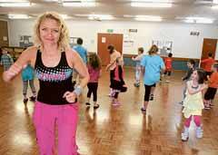 Instructor Emma Perrow leads the kids at Horsley Community Centre through a session of Zumbatomic - which is Zumba designed specifically for children. Pictures: ANDY ZAKELI