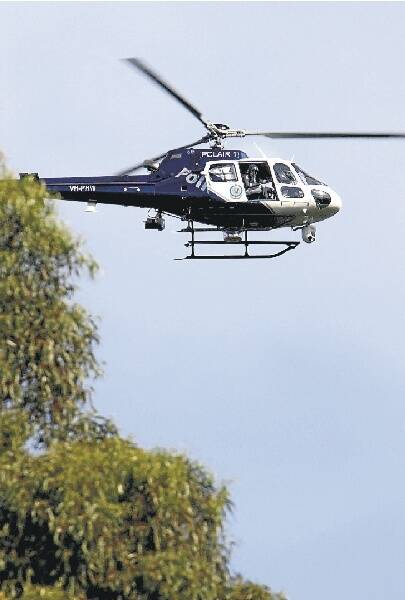 The PolAir police helicopter is being used in the search for Bruce Ludbrook. Pictures: HANK van STUIVENBERG