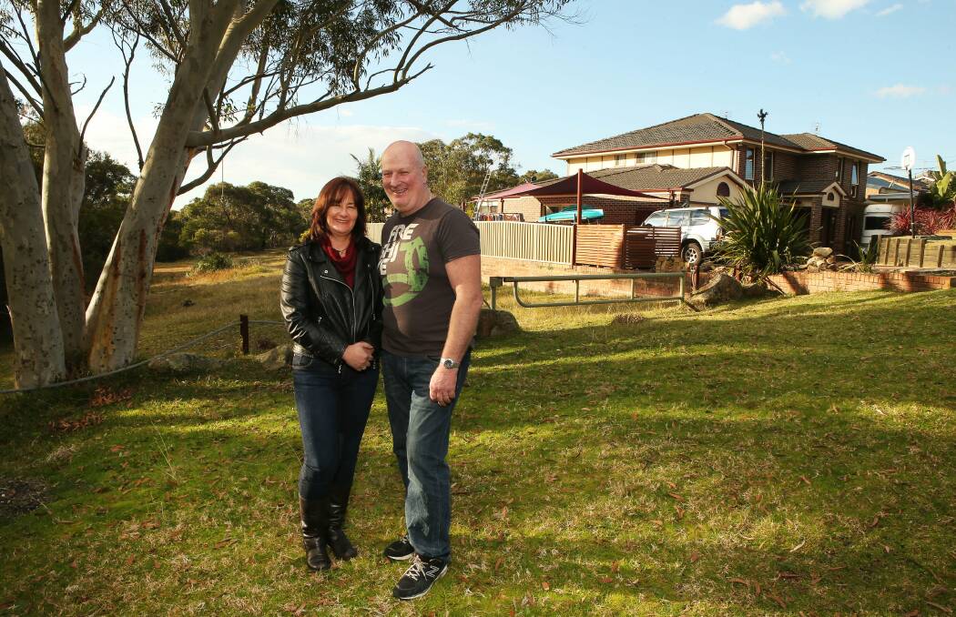  Phil and Anne Doran with their new home in the background. Pictures: KIRK GILMOUR