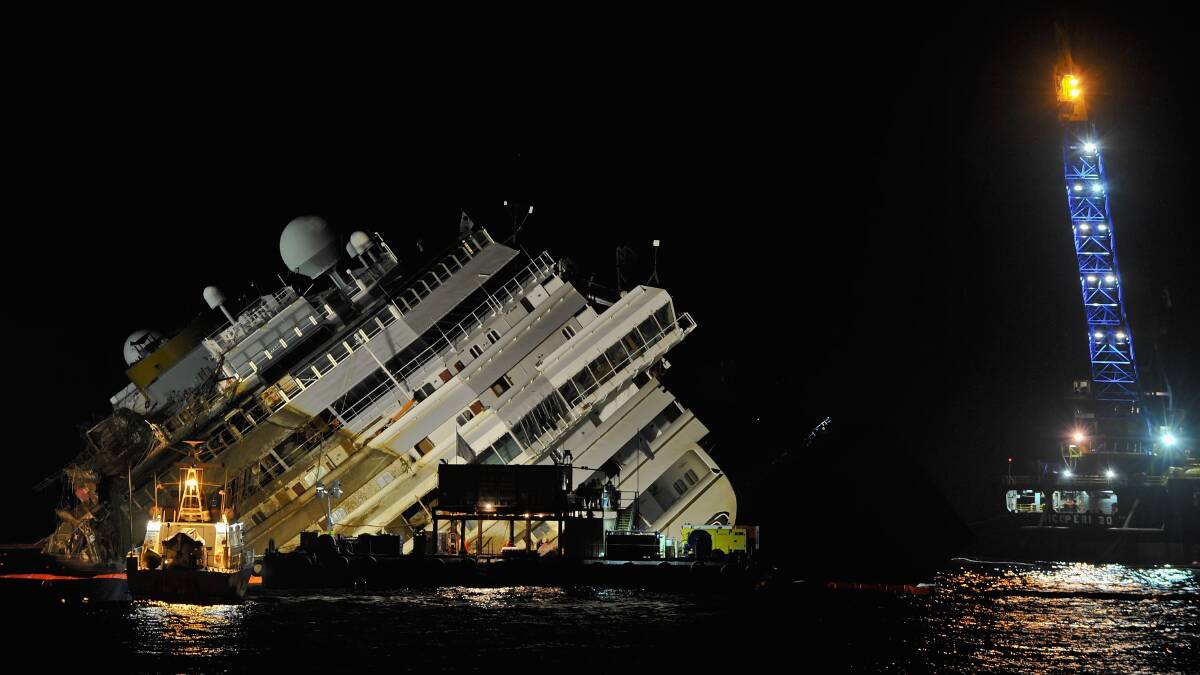 A 600 million euro operation ($862 million) to raise the 114,500 tonne Costa Concordia gets underway off the coast of Italy. Photos: REUTERS, GETTY IMAGES