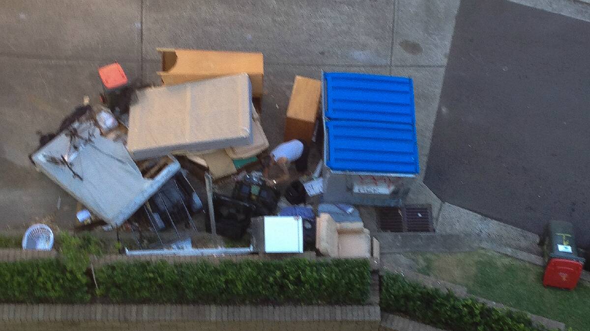 The pile of rubbish outside the Department of Housing units.