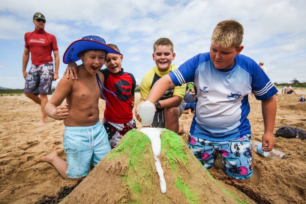 Jacob, Zac, Josh and Dylan with their sand volcano at Kiama Downs. Picture: DYLAN ROBINSON