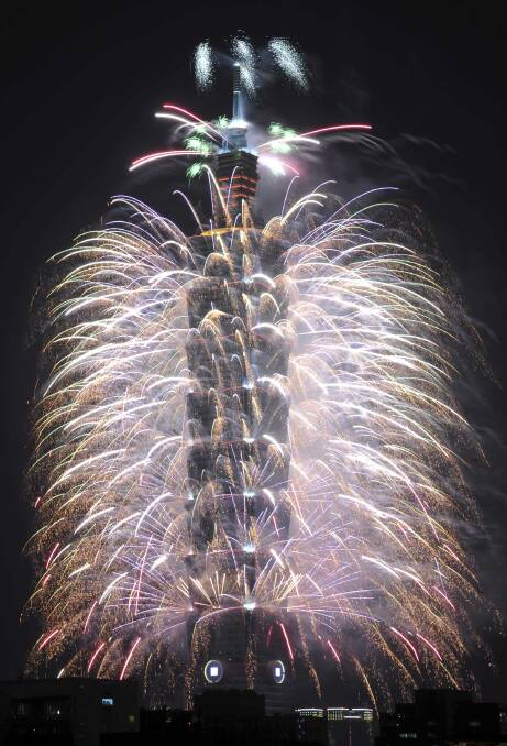 Fireworks over Taiwan's tallest skyscraper the Taipei 101. Picture REUTERS