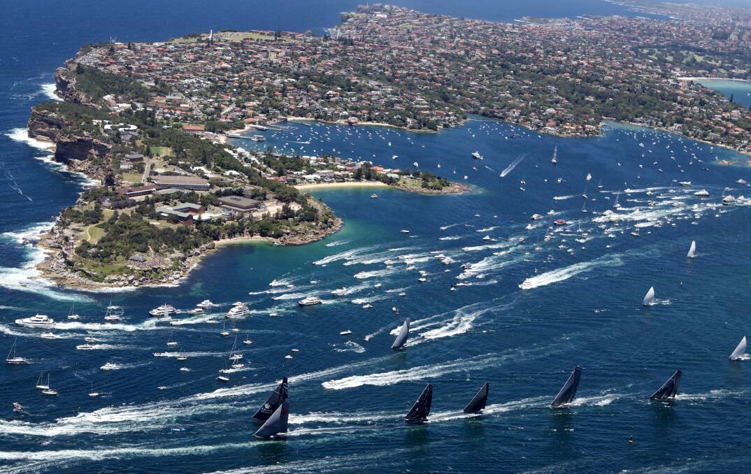 Wild Oates and Loyal neck and neck at the start of the Sydney to Hobart race. Picture BRENDAN ESPOSITO