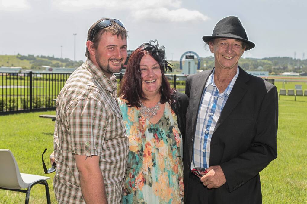 Joe Redfern with his parents Annette and Gary at Kembla Grange races.