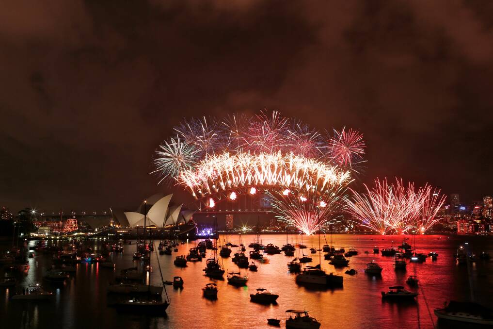 NYE fireworks from Macquarie's Chair. Picture JAMES BRICKWOOD