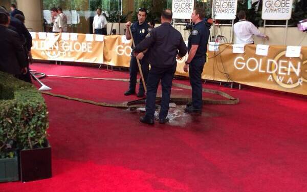Red carpet nightmare: the clean-up operation. Picture: @RyanSeacrest