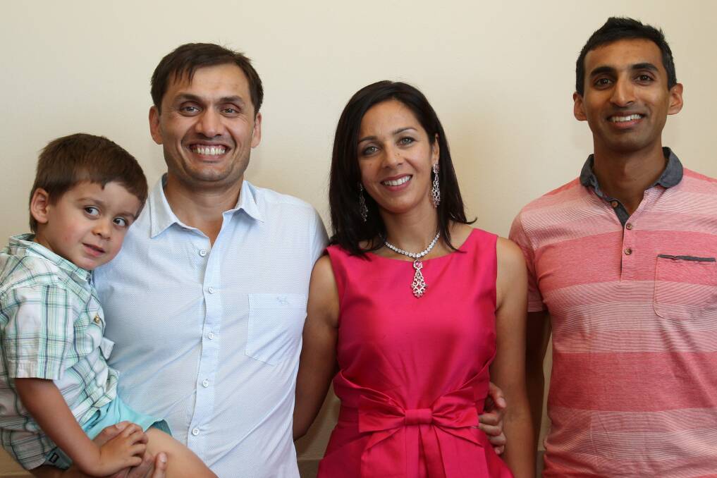 Rajeev, Rohit and Tina Tamhane and Aaditya Thakur at Manjit's Indian Restaurant in Corrimal.