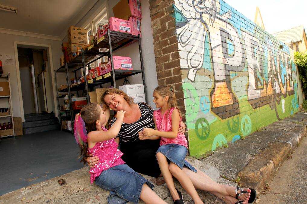 Help at hand: Rebecca Preston with grand-daughters, Tori, 7, and Tarni Ord, 8, at the Food Shed. Picture: Tamara Dean
