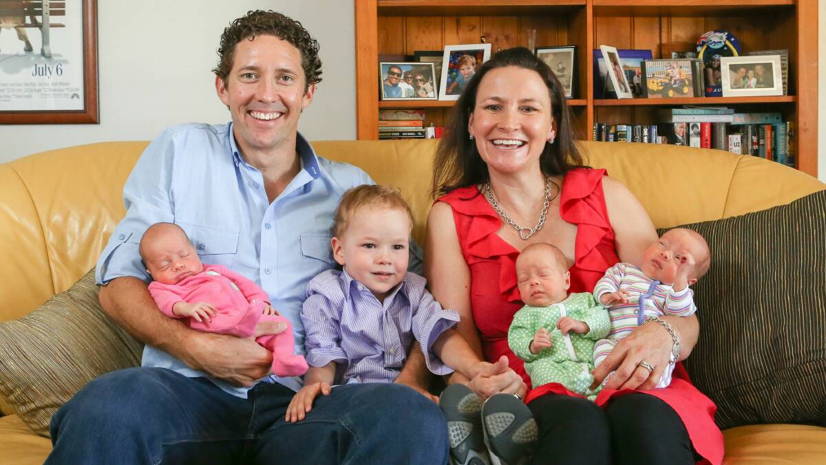 Peter and Ally Buckley with Fraser (centre), 2, and Eliza (pink), Bronte (green), and Chloe. Picture: ADAM McLEAN