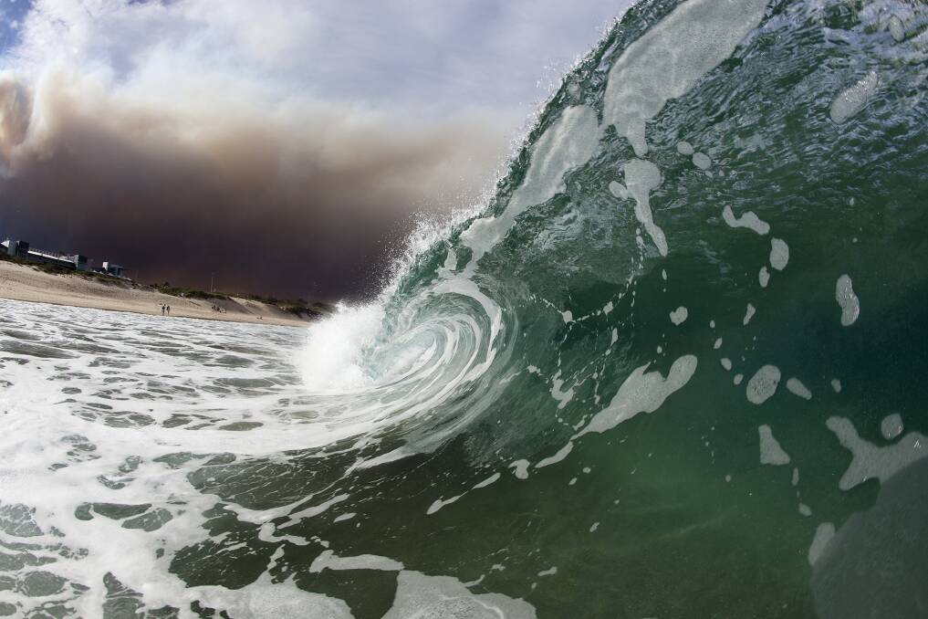 Smoke hangs over North Beach. PICTURE: Warren Keelan