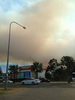 Smoke over Mt Ousley. Picture courtesy of Facebook.