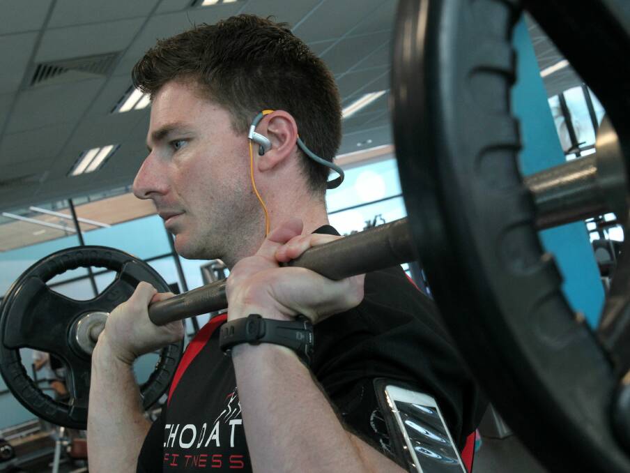 Lukas Chodat focusing on music during a workout. Picture: GREG TOTMAN 