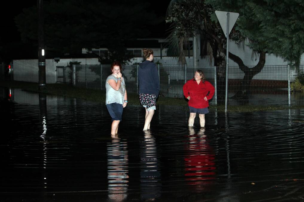 Scenes from George Street, Warilla, on Friday night. Picture: SYLVIA LIBER
