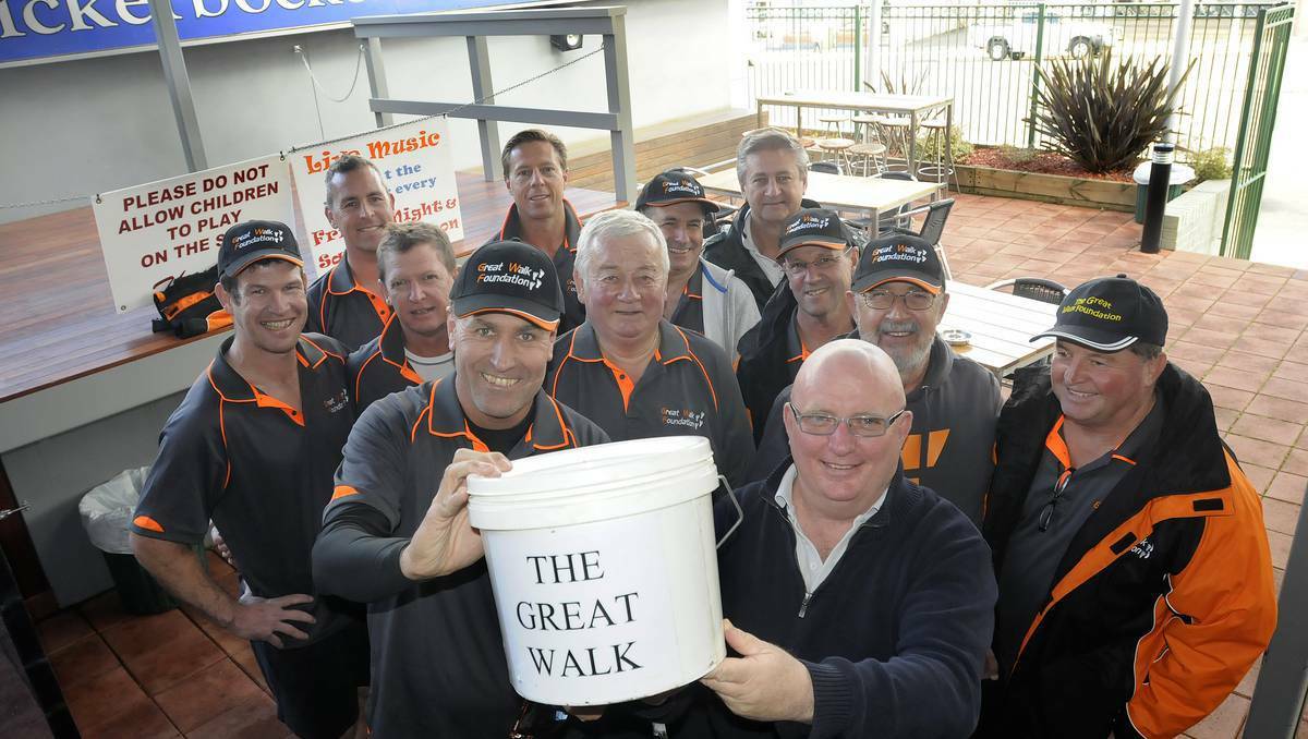BATHURST: Leader of The Great Walk team Jonathan Green, front left, and Scotty Macallister from the Knickerbocker Hotel in Bathurst ready to raise more funds for charity. Photo: CHRIS SEABROOK (WESTERN ADVOCATE) 