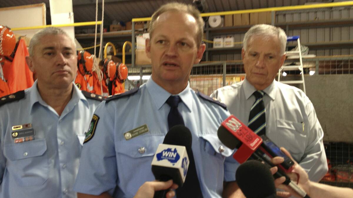 Greg Murphy, Lake Illawarra Police commander Wayne Starling and Kiama mayor Brian Petschler at the SES headquarters. Picture: Dave Tease.