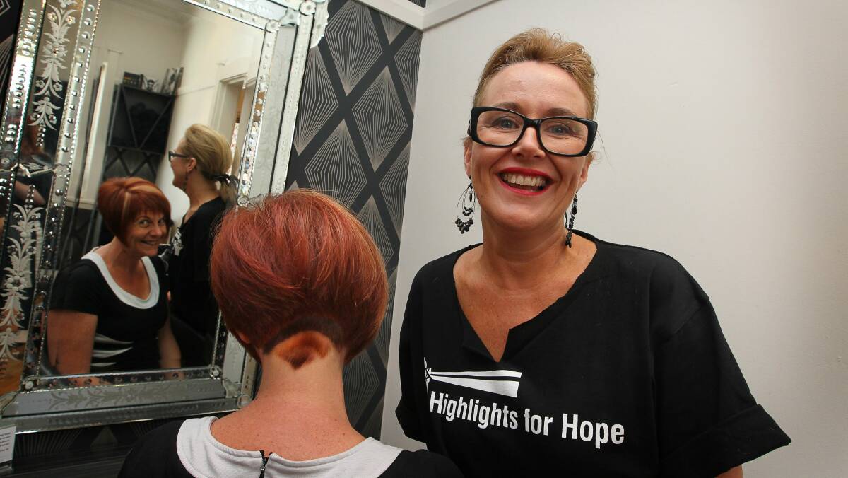 Allysan Lokker brings flair and precision to Debra Murphy’s new haircut. Picture: SYLVIA LIBER