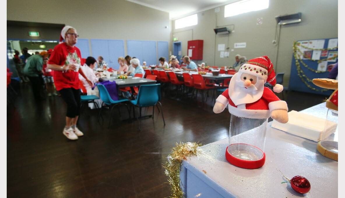 People enjoying the Warrawong Community Centre Christmas lunch. PICTURE: KIRK GILMOUR